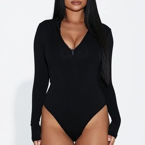 Naked Wardrobe The NW Zip It Good Bodysuit in Black